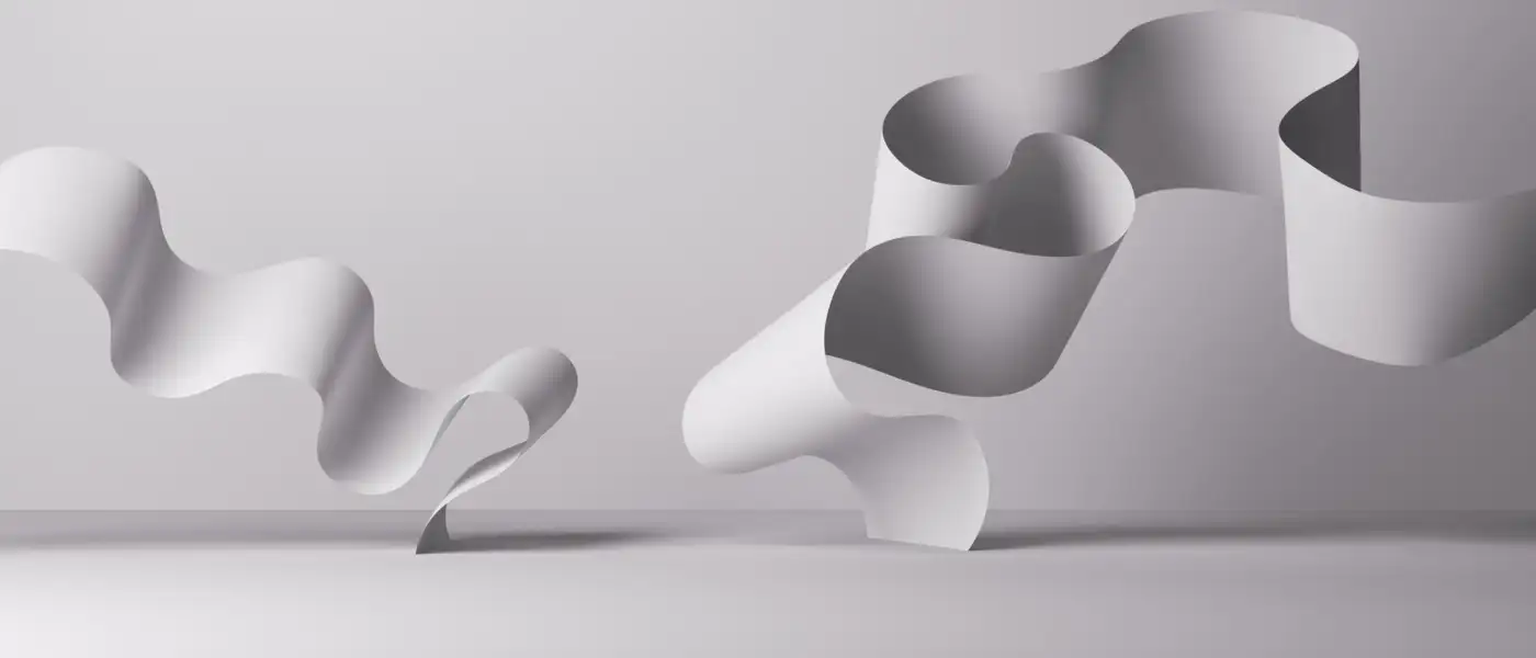 White ribbons folding and lifting off a plain pale surface
