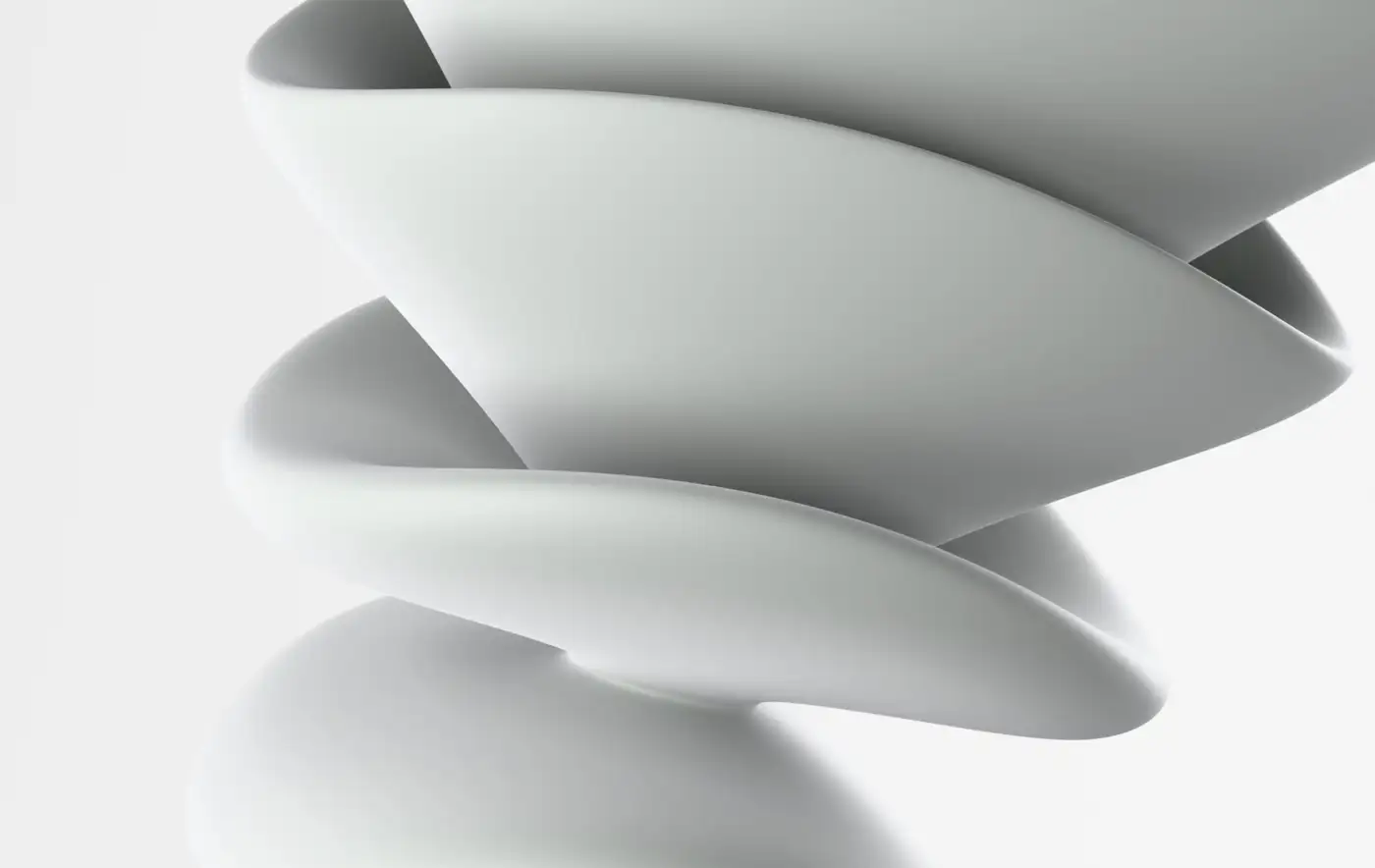Curved white forms stacked and turning, each slightly offset from the last