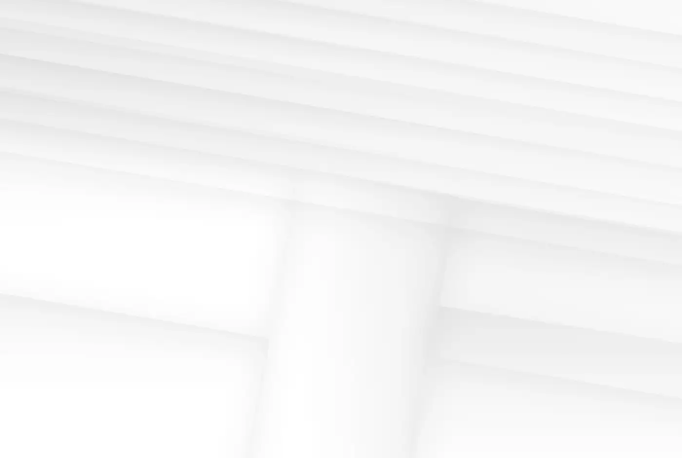 Pale overlapping planes in soft, even light, their edges barely distinguishable